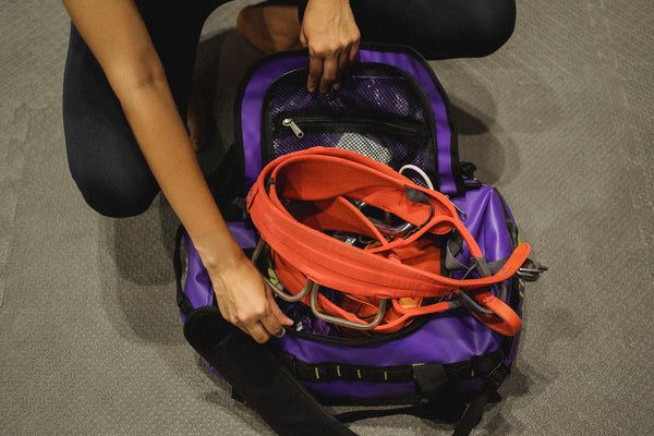 packing purple sports bag