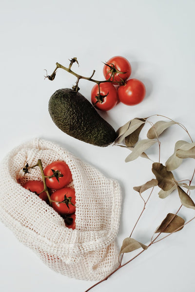 tomatoes in a reusable shopping bag