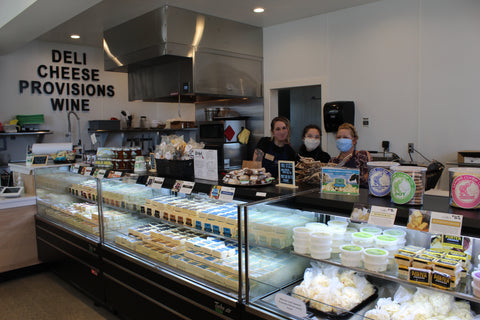 The interior of Face Rock Coos Bay Village showing a fully loaded cheese case