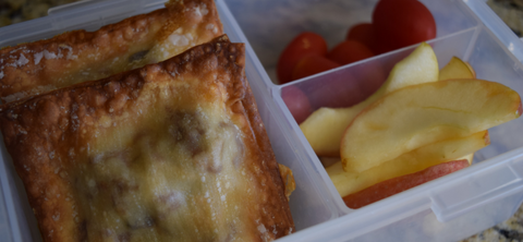 a picture of a lunch box that has vampire slayer taco bites