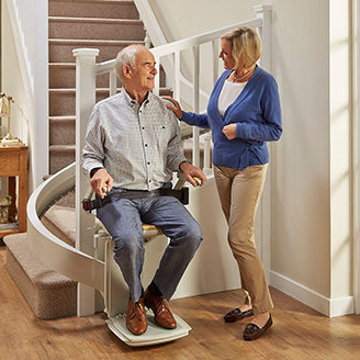 patient preparing to ascend with a stairlift