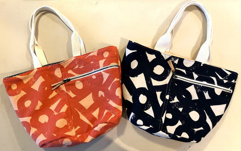 Crescent tote bags