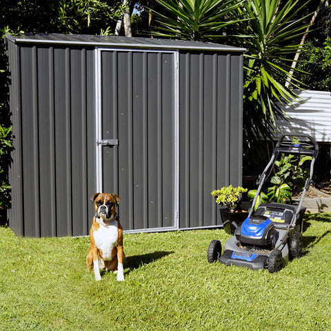 AB1105 Absco 7' x 3' Space Saver Metal Storage Shed with a dog and lawnmower.