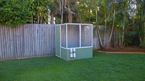 AB1201 Absco Chicken Coop 5' x 5' placed in a backyard.