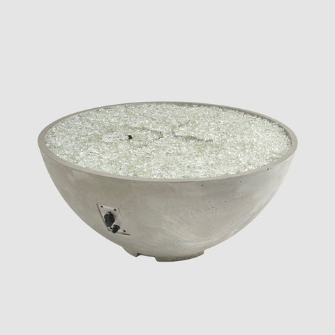 Outdoor Greatroom Co Cove Edge Round 42-Inch Gas Fire Pit Bowl in natural grey, filled with glass beads and no flame, SKU CV-30E.