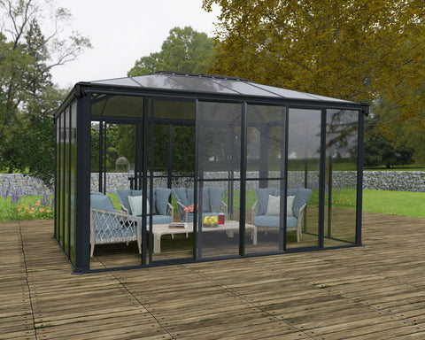 Canopia Ledro Enclosed Gazebo in Gray/Bronze used with furniture inside.