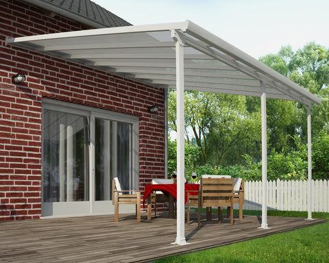 Canopia Feria Patio Cover - White/Clear used beside a house with furniture.