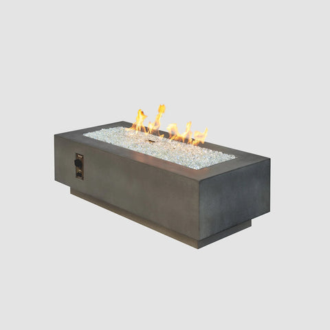 Outdoor Greatroom Co Cove Linear 54-Inch Gas Fire Pit Table in Midnight Mist on a White Background.
