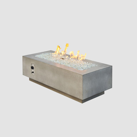 Outdoor Greatroom Co Cove Linear 54-Inch Gas Fire Pit Table in Natural Grey Color on a White Background.