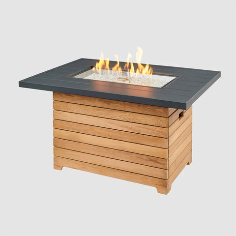 Main product image of the Outdoor Greatroom Co Darien Fire Pit Table with flames, showcasing the overall design and ambiance.