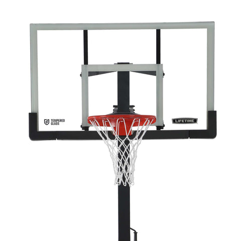 Close-up of the 60-inch tempered glass backboard of the Lifetime Adjustable Bolt Down Basketball Hoop.