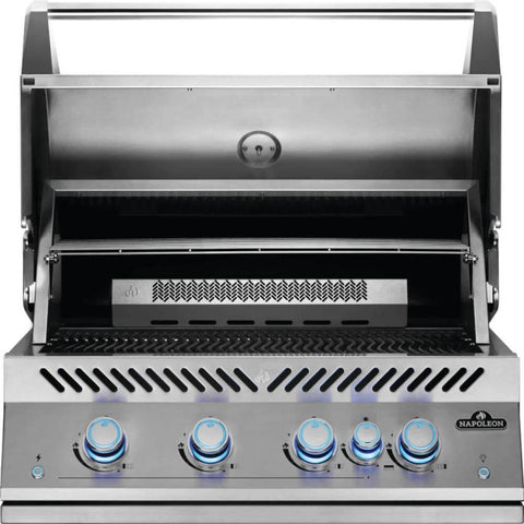Open view of the Napoleon Grills Built-In 700 Series 32-Inch 5-Burner Gas Grill Head, displaying the warming rack and interior grilling surface.