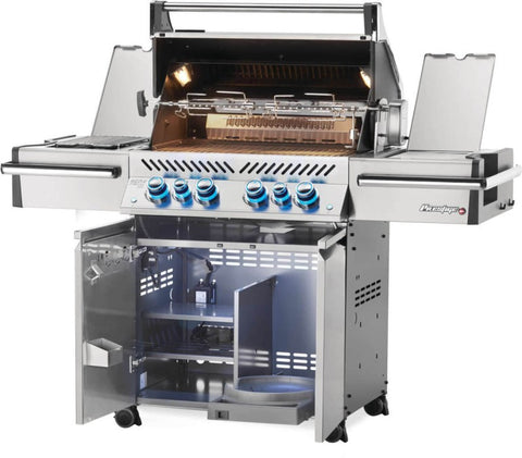 Opened Napoleon Grills Prestige PRO™ 500 RSIB, emphasizing the grill's cooking capabilities and storage capacity.