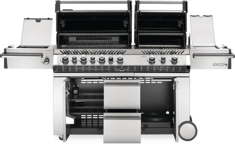 Interior view of the Napoleon Grills Prestige PRO™ 825 RSIB with open lids revealing the cooking grids, infrared bottom burners, and spacious grilling area.