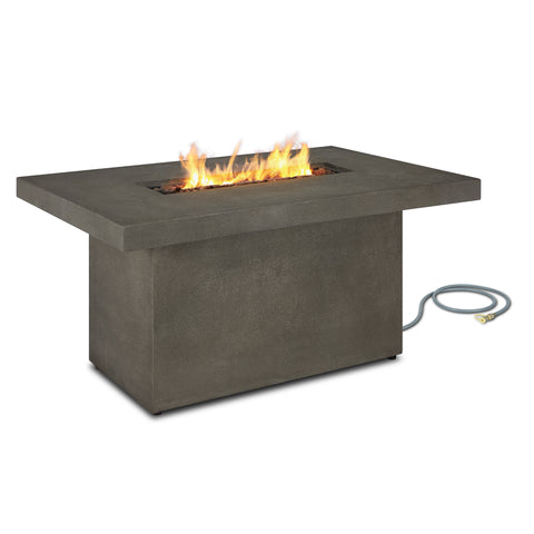 Ventura Real Flame rectangle patio fire table compatible with natural gas, showcased with a visible gas hose and lit flames C9640LP-TGLG With Conversion: Image of a fire pit with hose