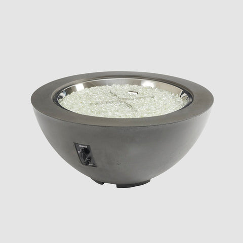 Round gas fire pit bowl in Midnight Mist finish with glass beads, no flame visible.