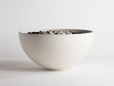 Halva Solus Decor firebowl, a modern outdoor fire pit with a subtle finish and flame control, for contemporary spaces.