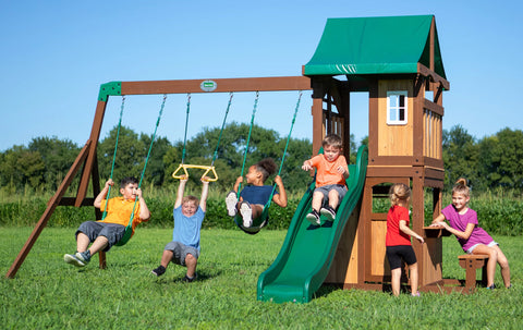 children playing on the backyard discovery lakewood cedar playset