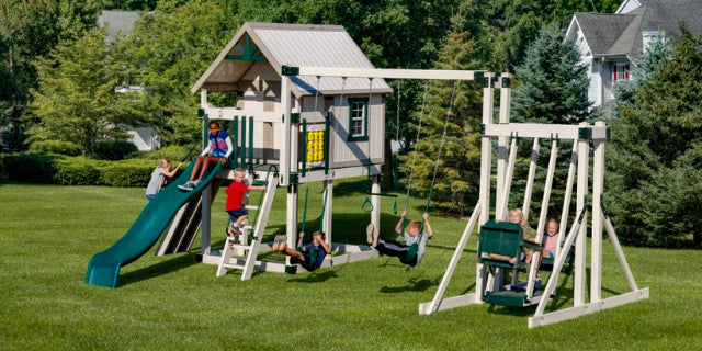 children playing on white vinyl playset