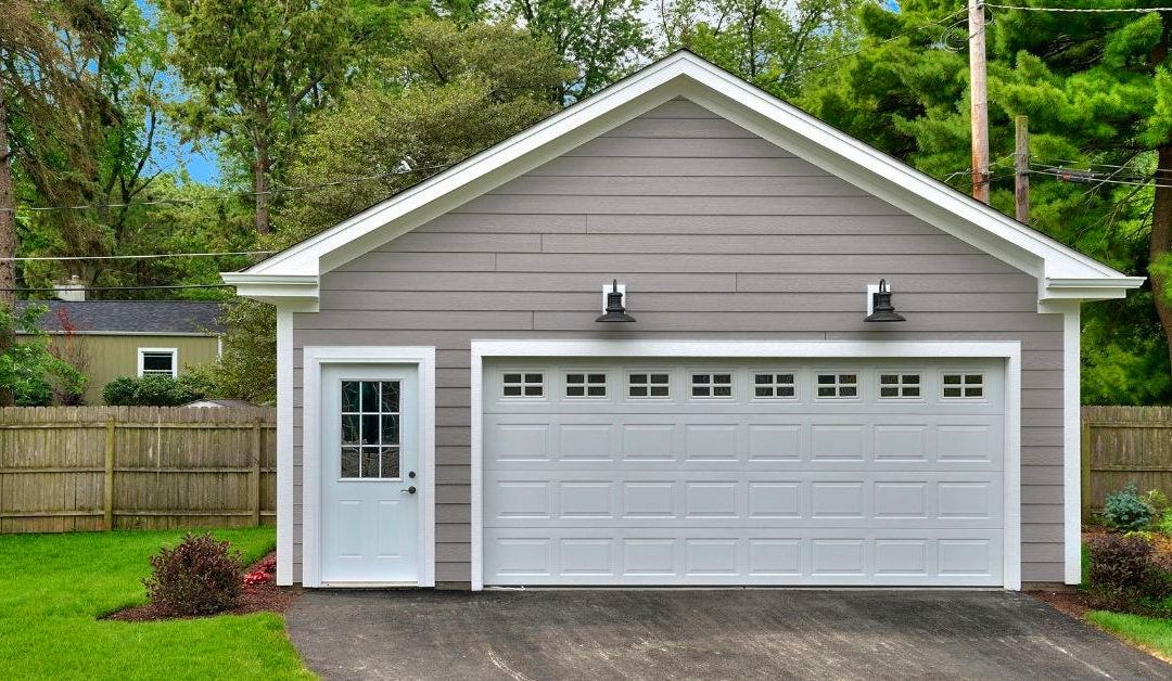 detached garage with windows on lawn