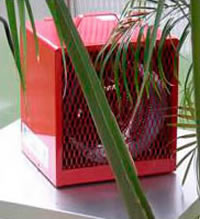 Exaco Victorian Greenhouse Accessory red heater for heating the greenhouse.