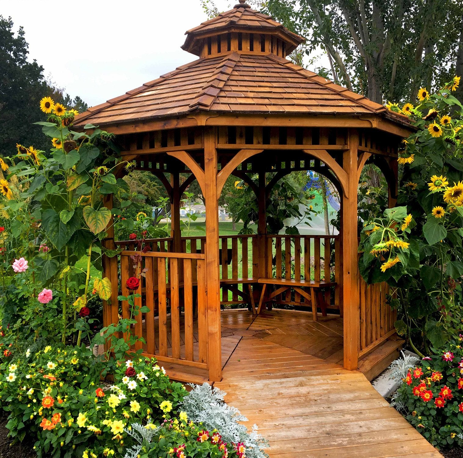 outdoor living today bayside gazebo with ramp surrounded by flowers