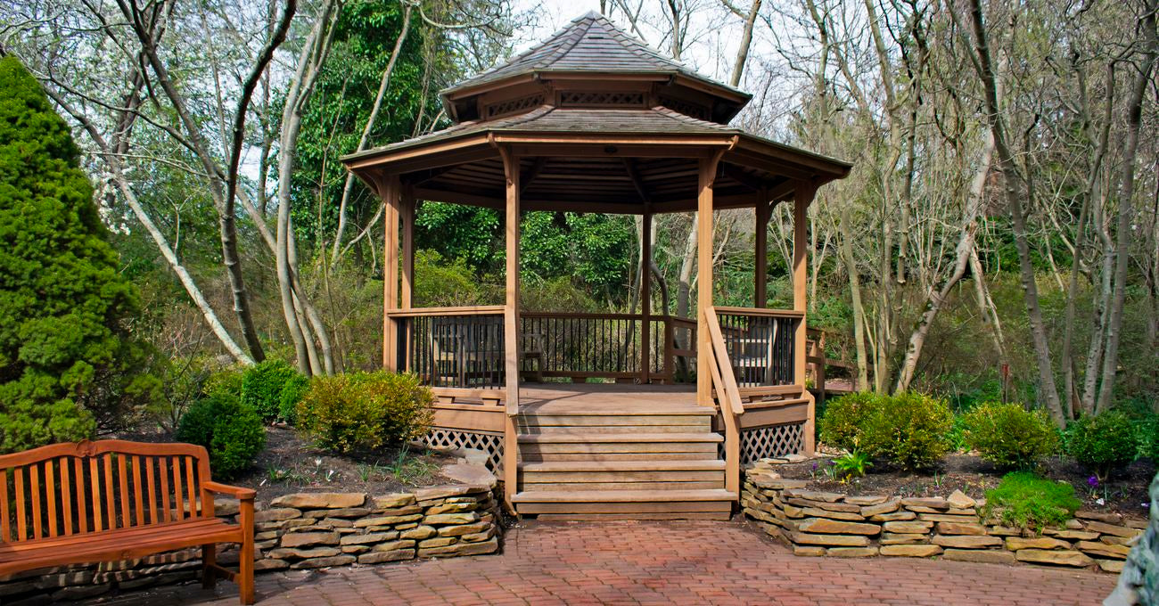 raised wooden hexagon gazebo with stairs