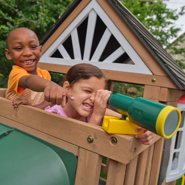 two kids playing with a telescope on the kidkraft timberlake playset