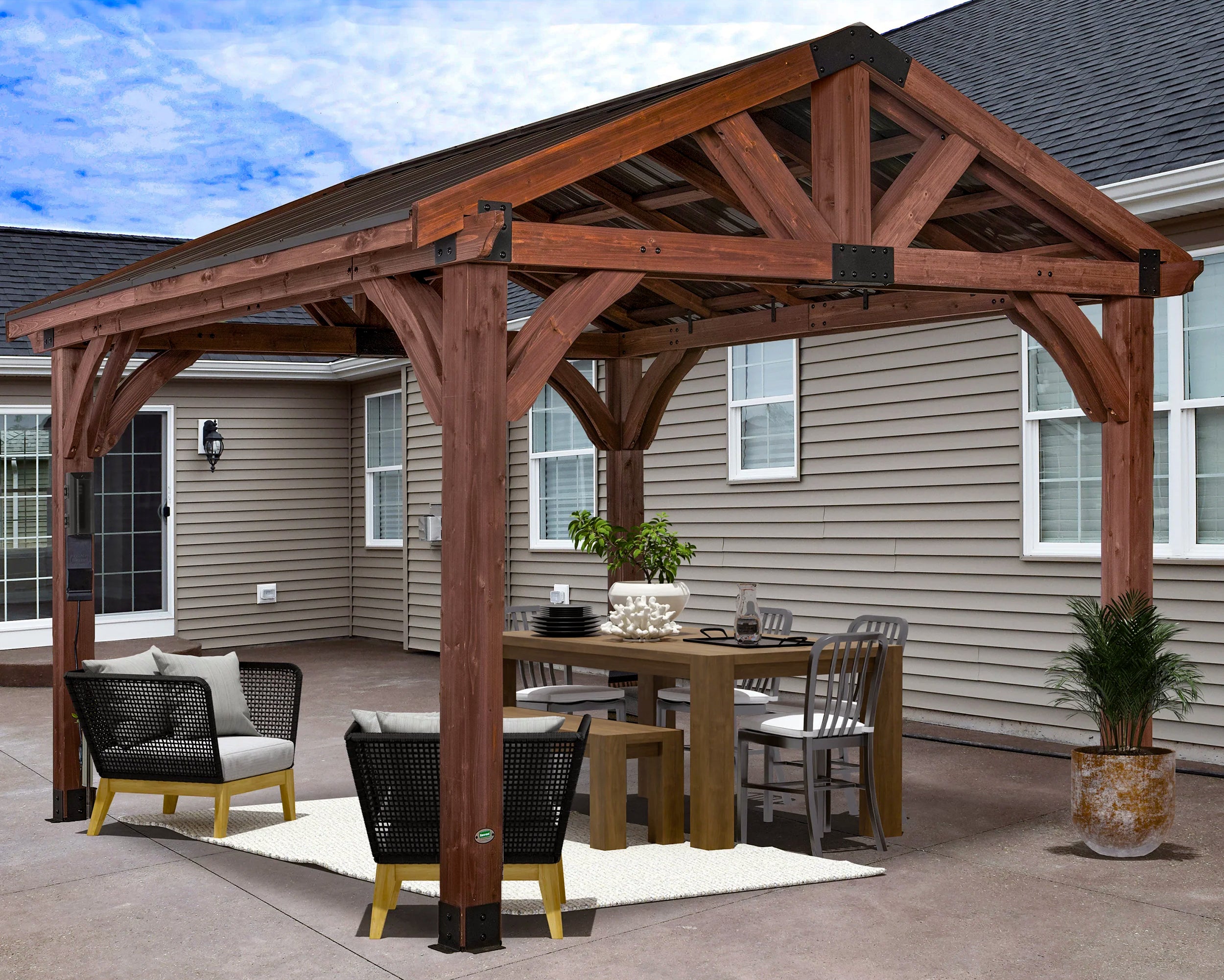 wooden gazebo with outdoor furniture anchored to concrete