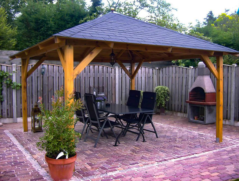 wooden gazebo with shingles on roof and outdoor seating and fireplace