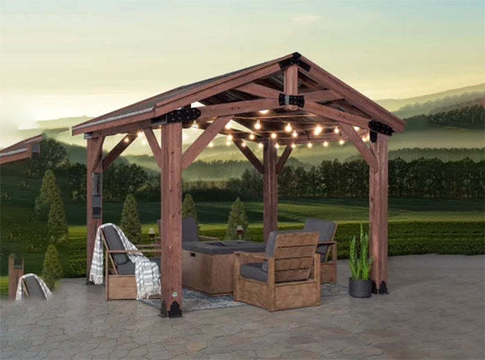 wooden gazebo with string lights and outdoor seating