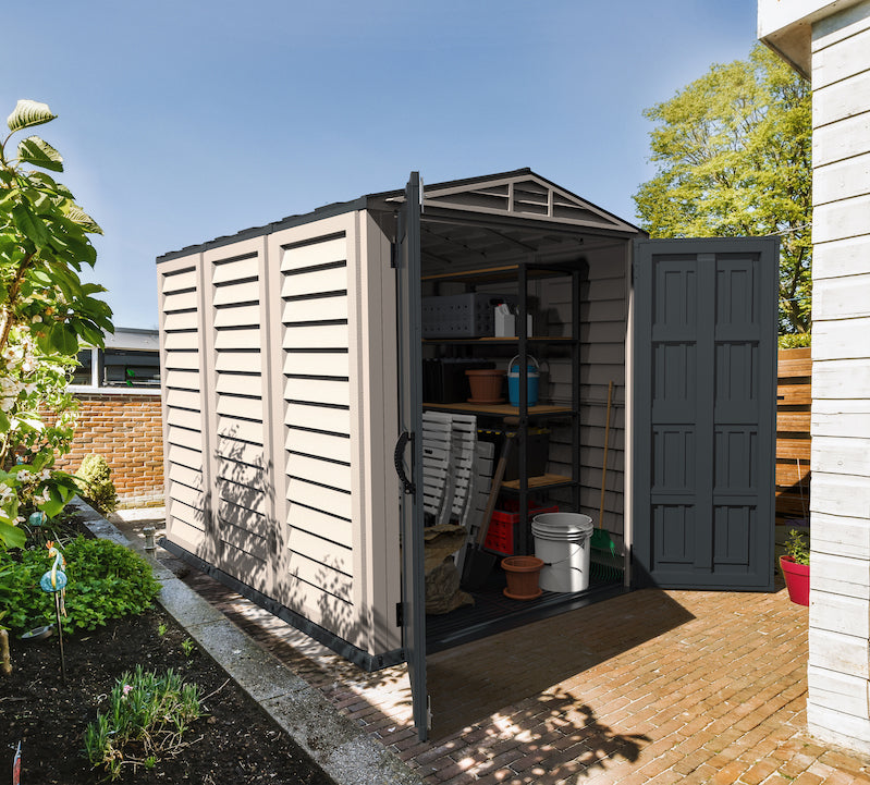 Inside view of Duramax YardMate Plus 5x8 shed showing spacious interior and shelving, perfect for organizing tools and garden supplies.