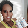 Smiling lady with two product bottles