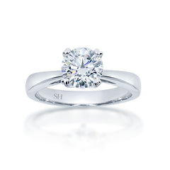 4-Claw solitaire engagement ring with heart shaped prong tips