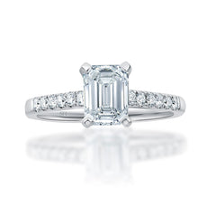 Timeless Emerald Cut Four claw diamond ring