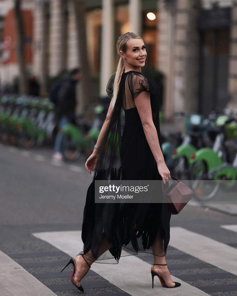 Marina Von Lison wearing Thalie Paris brown Cleo top handle bag