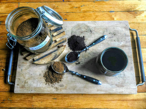 Mushroom adaptogens on wooden tray.