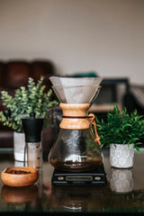 Pour over coffee maker on table.