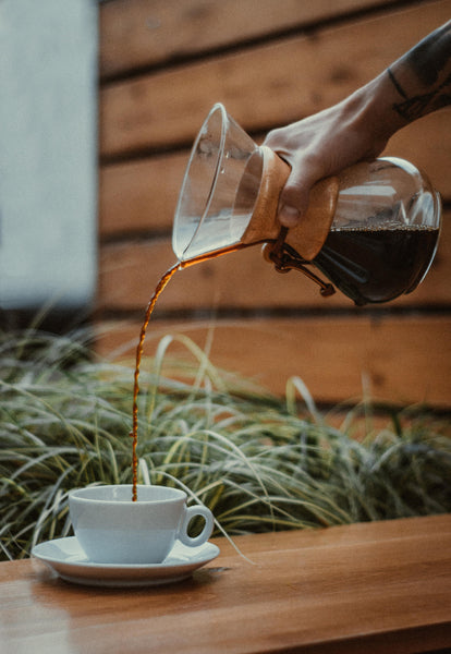 Fresh, low-acid coffee pouring into cup. 