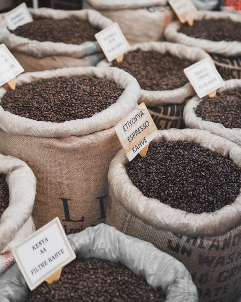 Coffee beans transported in burlap sacks.