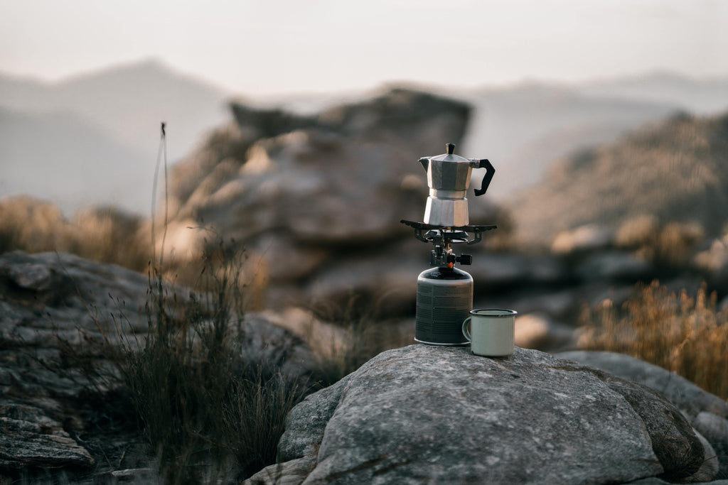 Moka pot brewing in nature.