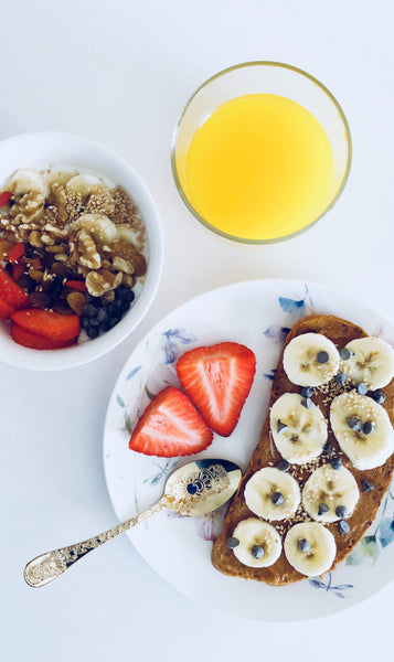 Glass of orange juice and a healthy, immune-boosting breakfast.