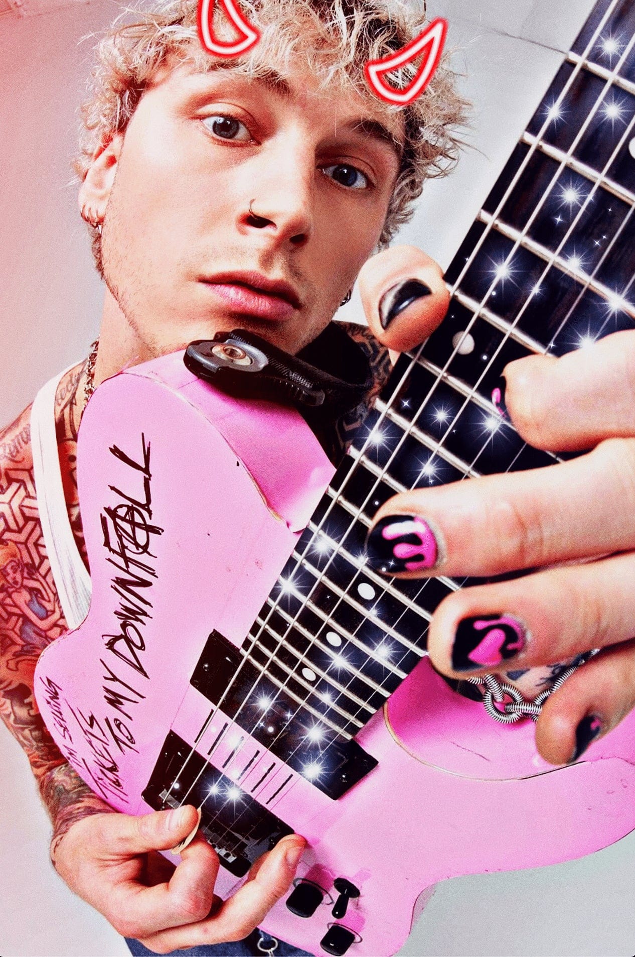 pink guitar mgk