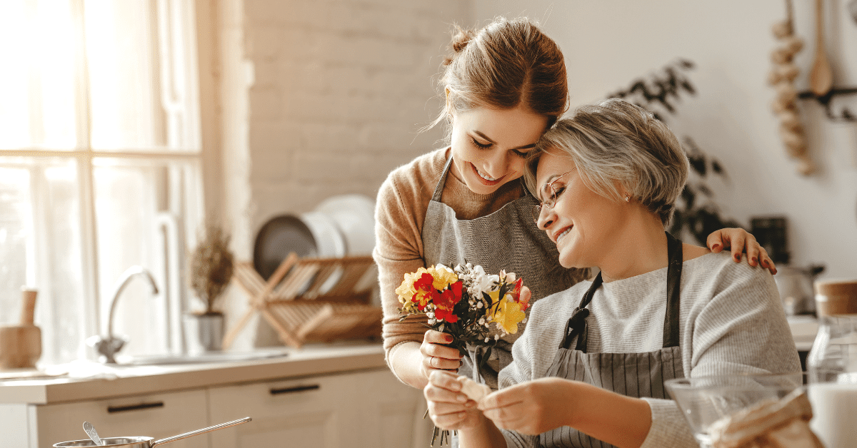 A photo of a mom and child cooking or baking together, showcasing the idea of gifting a DIY project or activity.