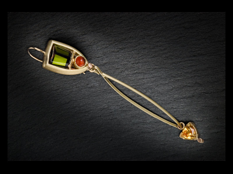 Green tourmaline, fire opal cabochon, and yellow sapphire