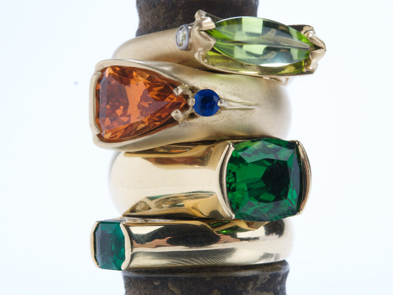18K Gold Rings -top to bottom- Peridot & Diamonds | Topaz | Hauynite Tourmaline & Yellow Sapphires | Emerald & Diamonds