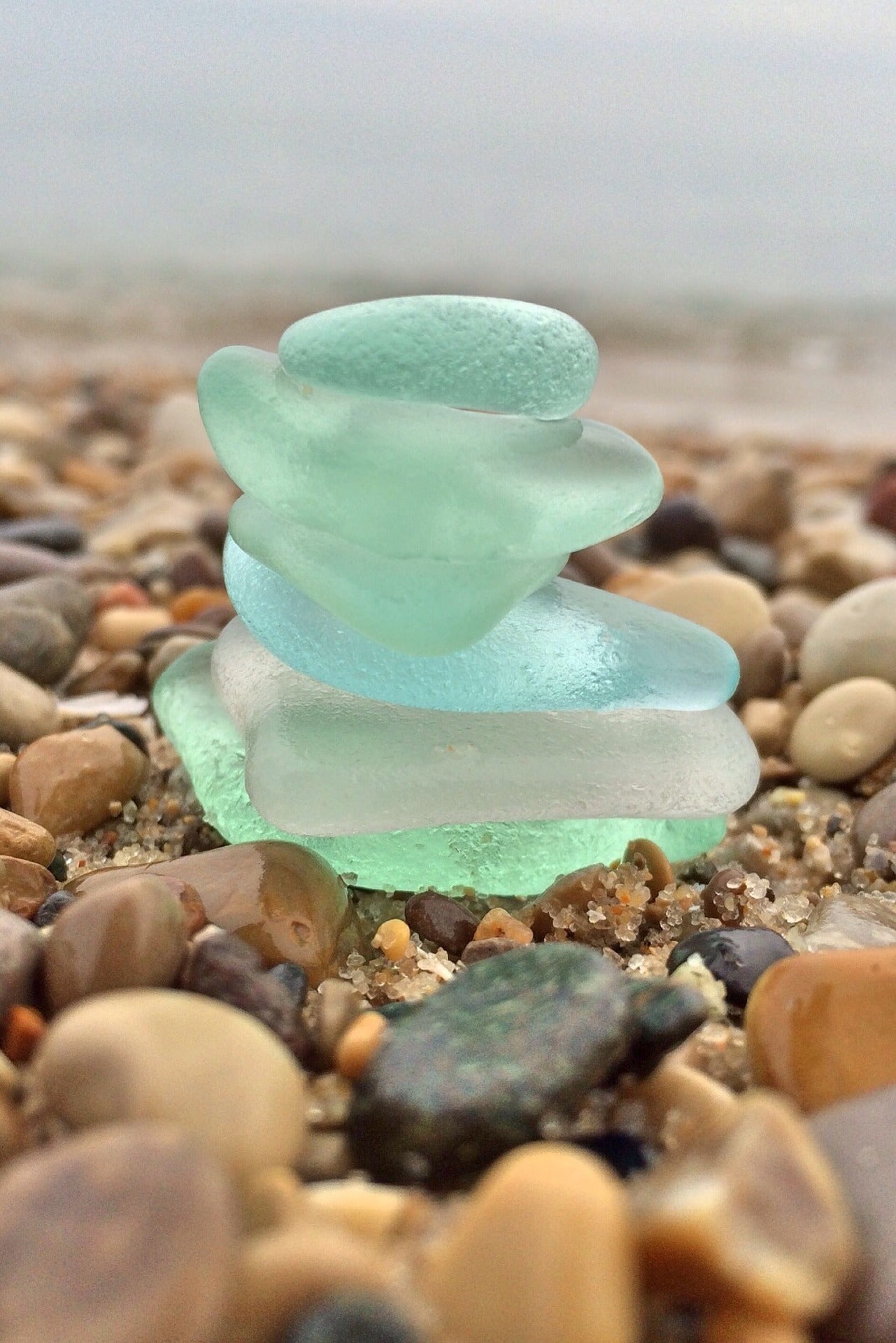 stack of sea glass on the beach