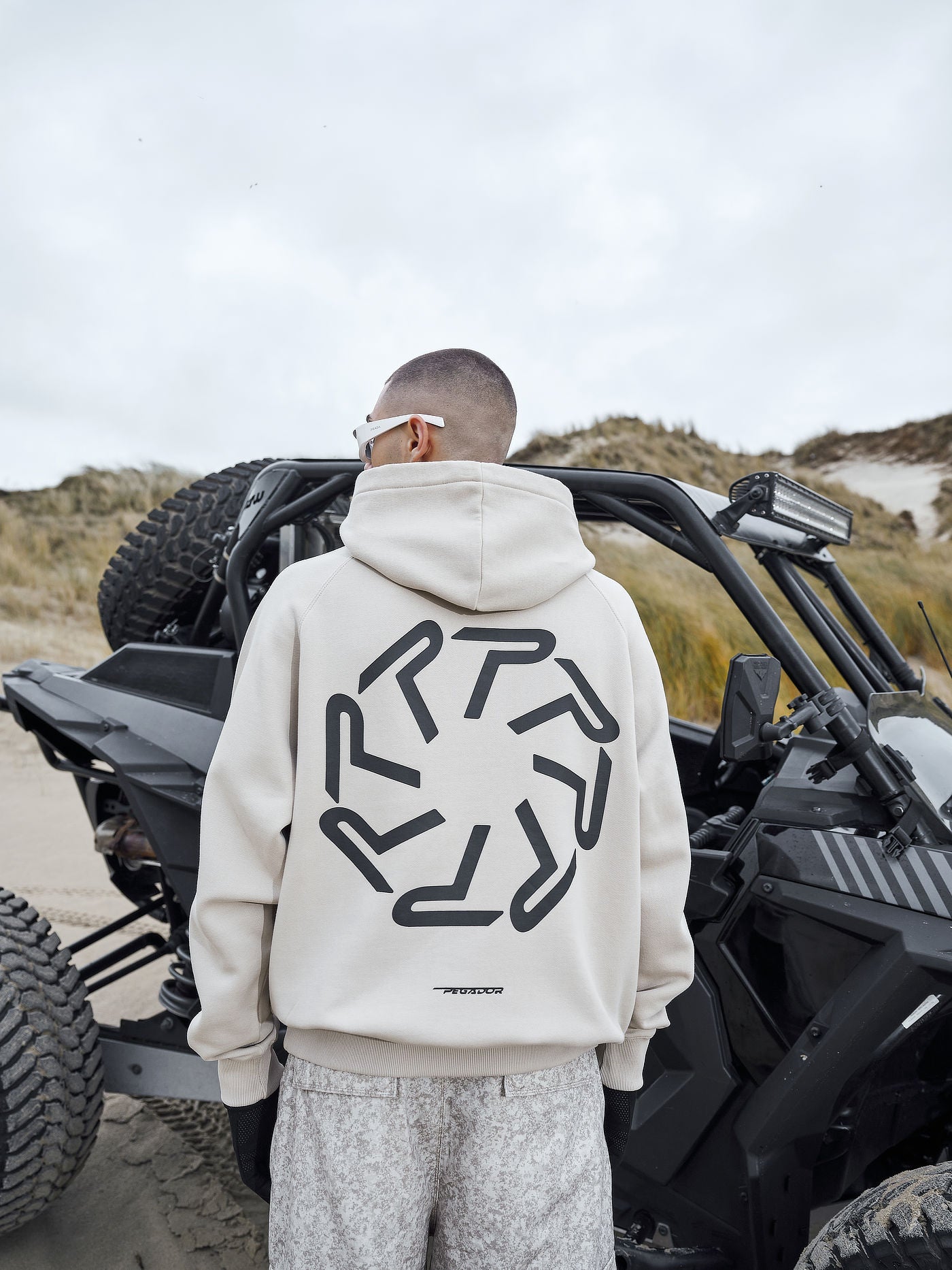 Barone Raglan Hoodie Washed Dust Cream from the 'Do Not Disturb' collection, designed for comfort and relaxation, set against a serene background, symbolizing a break from the fast-paced world.