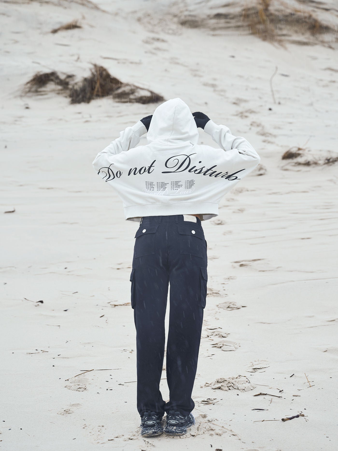 Vrena Oversized Cropped Hoodie Washed Salty Cream from the 'Do Not Disturb' collection, designed for comfort and relaxation, set against a serene background, symbolizing a break from the fast-paced world.