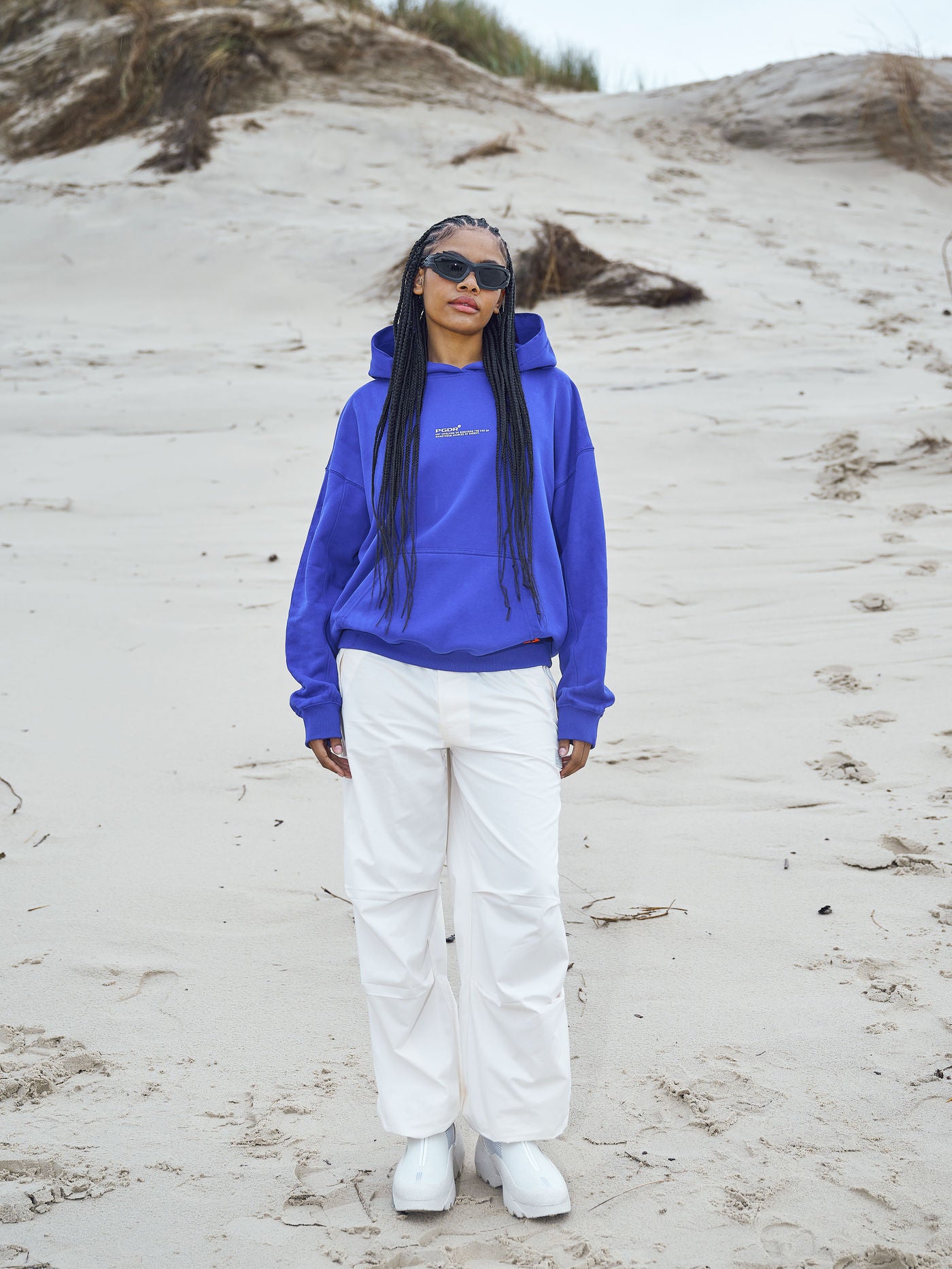 Navisk Oversized Hoodie Washed Endless Blue from the 'Do Not Disturb' collection, designed for comfort and relaxation, set against a serene background, symbolizing a break from the fast-paced world.